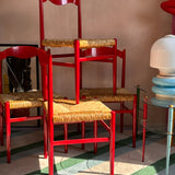 4 1970s red Italian dining chairs in the style of Gio Ponti