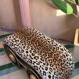 1960s leopard print scroll bench